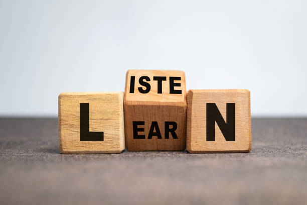 listen and learn words on turn wooden blocks isolated on white background listen and learn words on turn wooden blocks isolated on white background